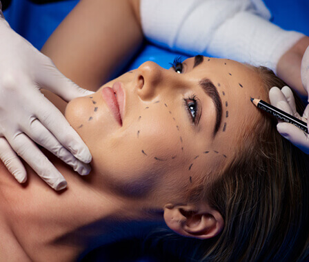Woman having face prepped for plastic surgery