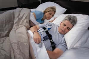 Middle Aged Couple Sleeping in Home sleep study