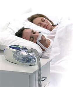 CPAP Being Used to Deal with Sleeping Man's Sleep Apnea